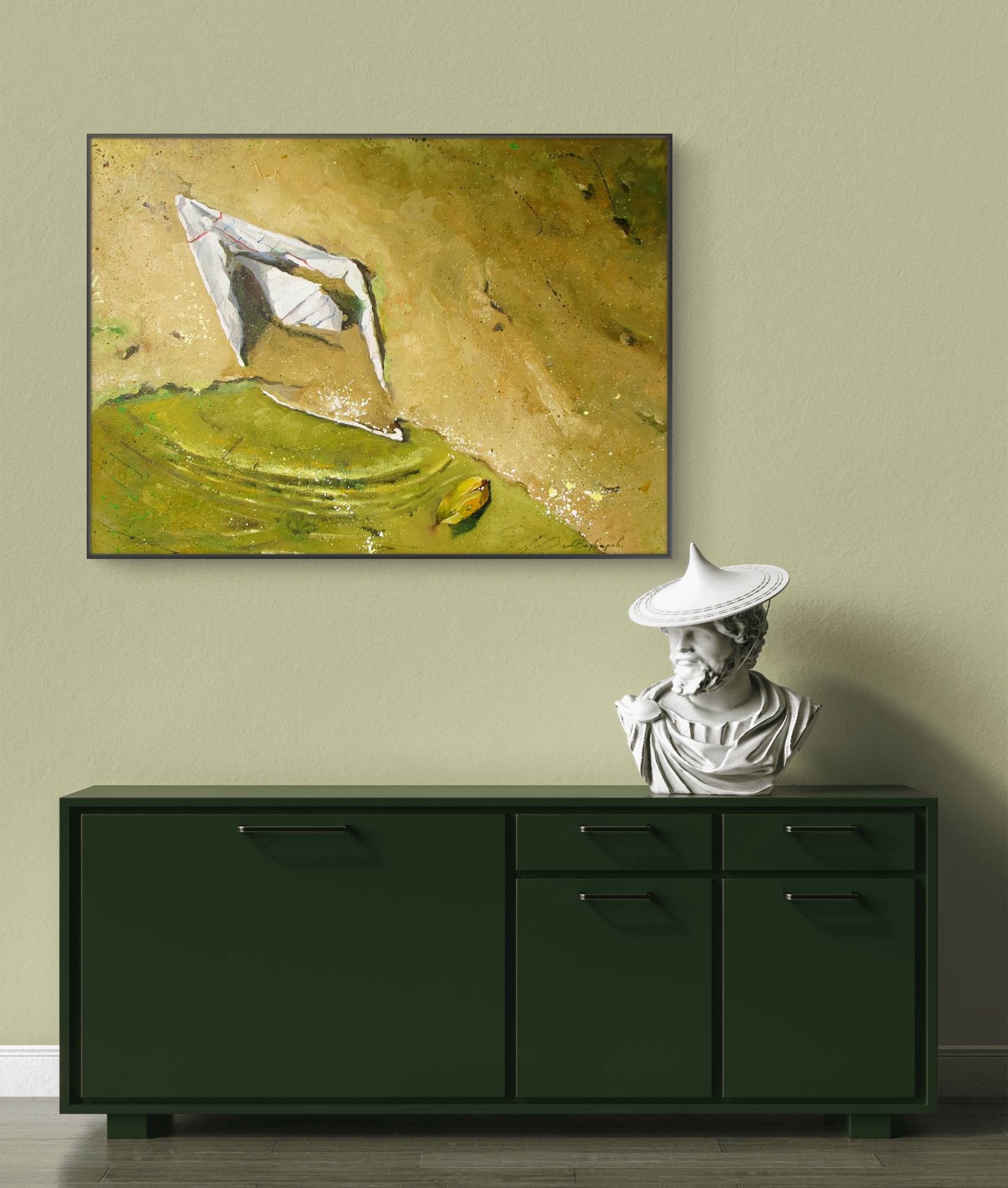 Green cabinet with a white sculpture of a person wearing a hat, against a beige wall with a framed abstract painting.