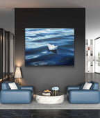 Modern living room with a large painting of a paper boat on water.