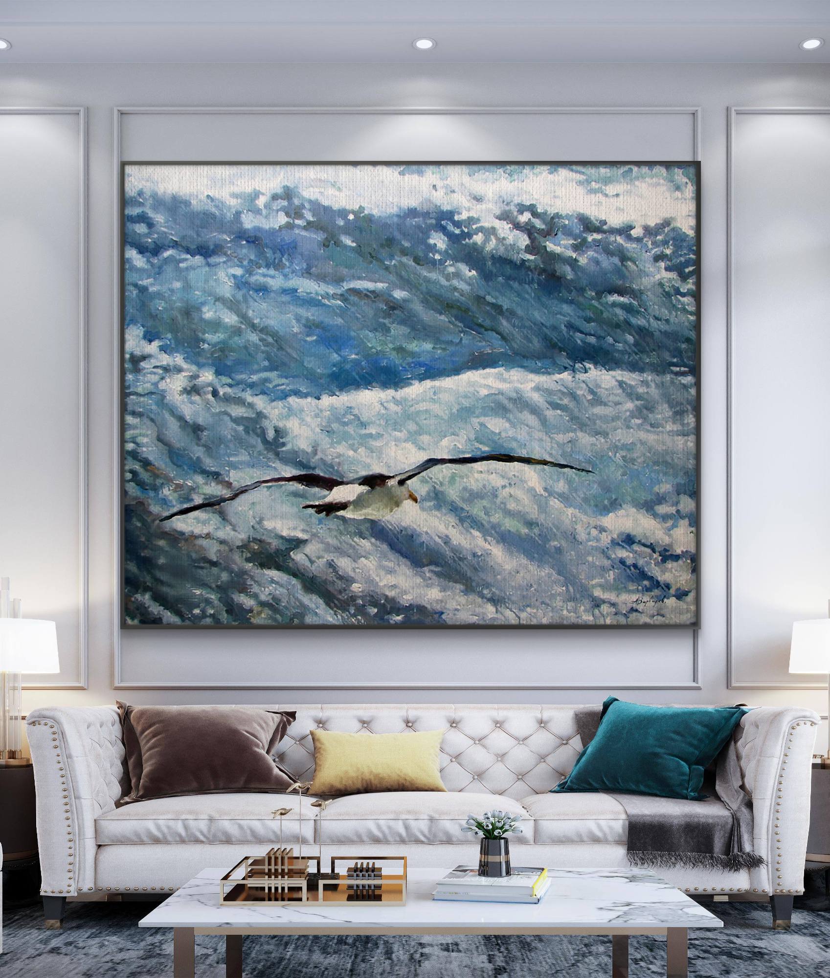 Living room with a large abstract painting of a bird over water, white sofa with colorful pillows, and coffee table.