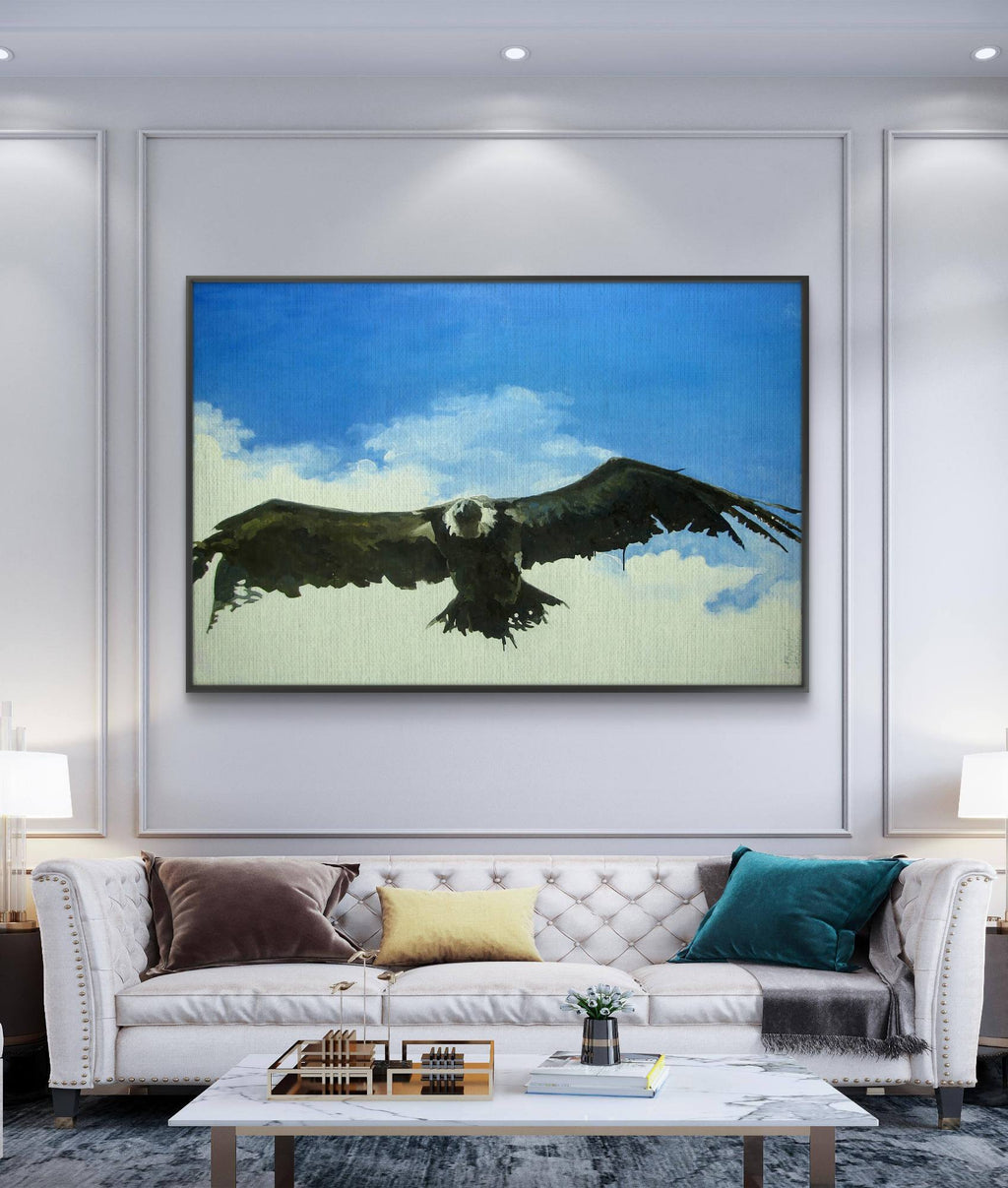 Living room with a large painting of an eagle on the wall above a sofa.