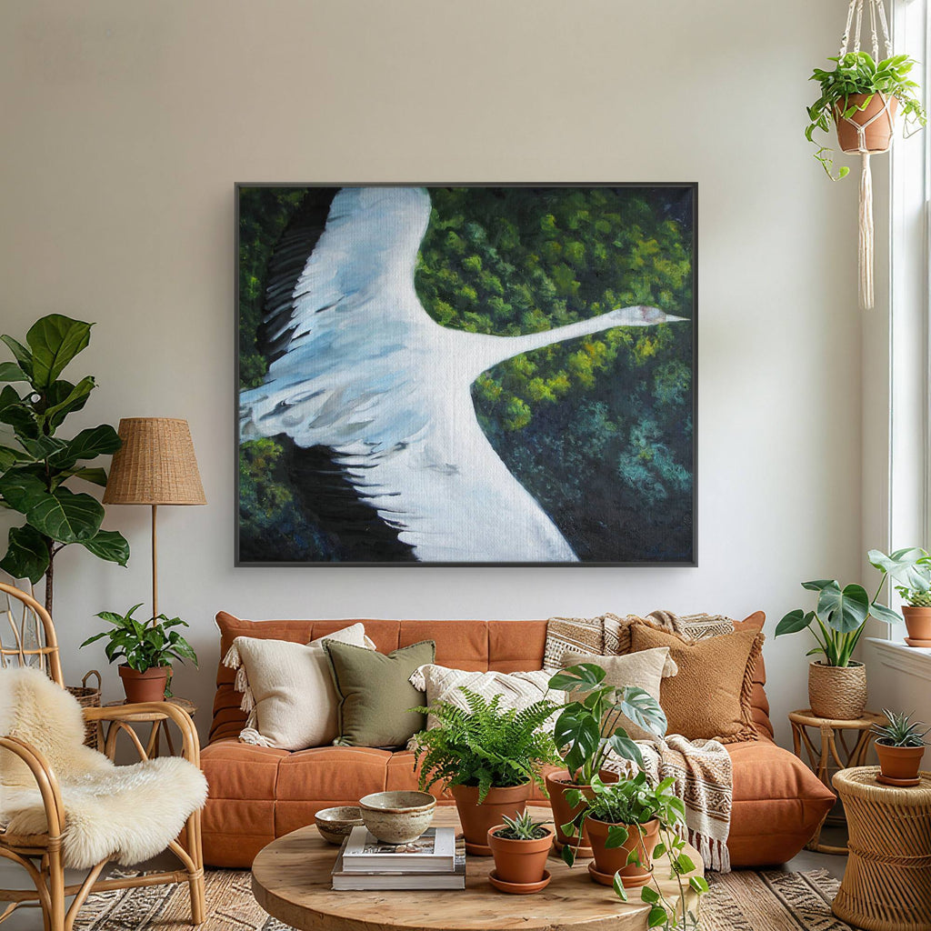 Living room with orange sofa, decorative pillows, and a large painting of a bird on the wall.