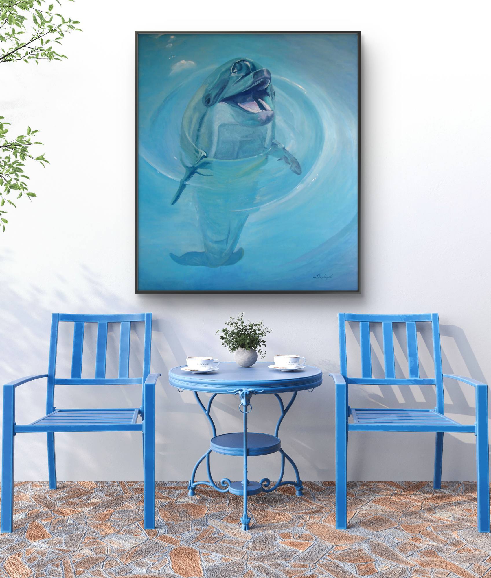Blue chairs and table set with a dolphin painting on the wall