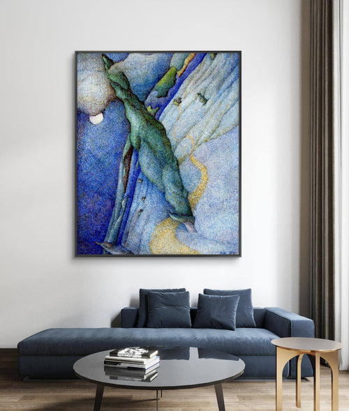 Abstract painting in a modern living room with a blue sofa and round coffee table.