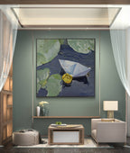 Modern living room with a painting of a boat on water, green walls, and neutral furniture.