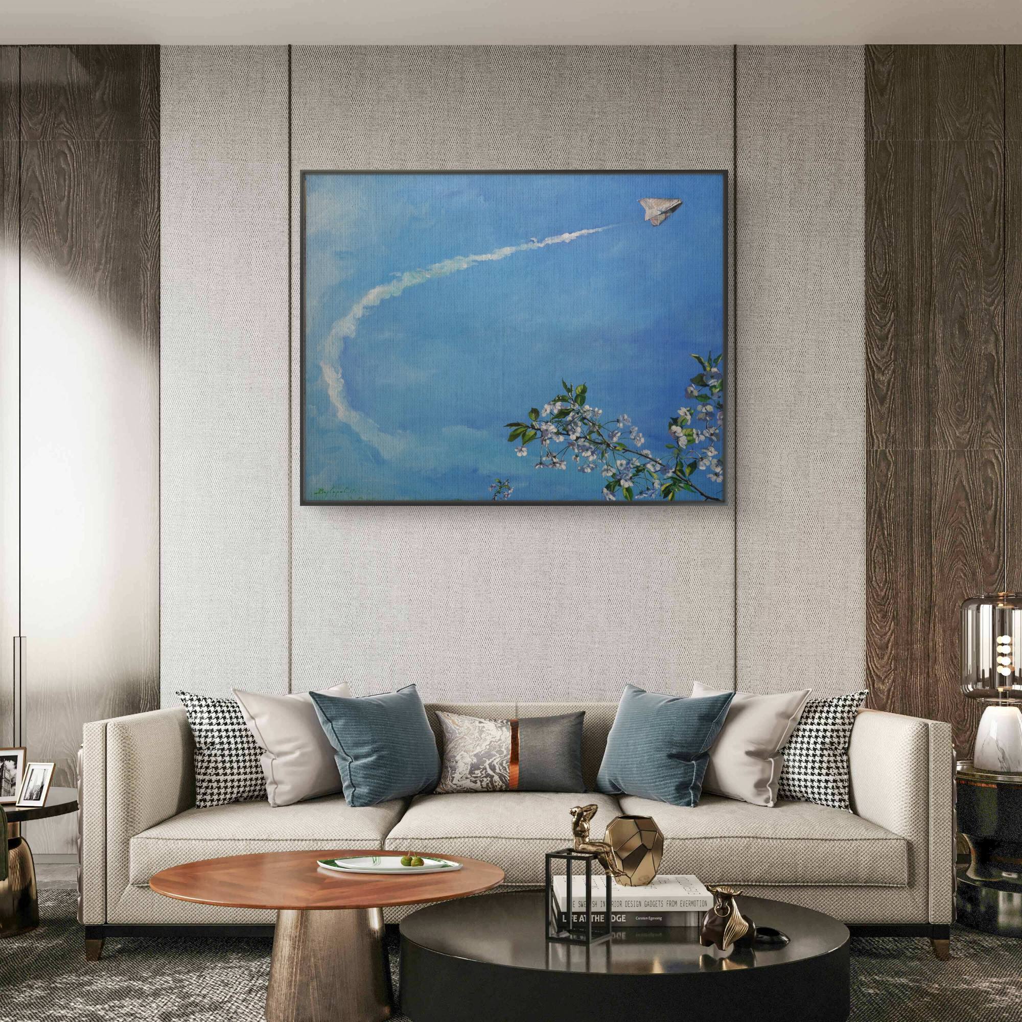 Modern living room with a sofa, coffee table, and wall art.