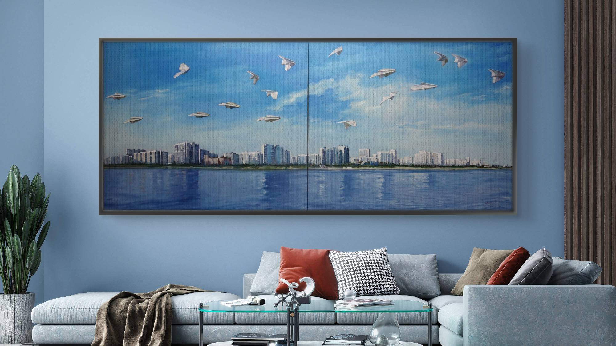 Living room with a large wall art piece depicting a city skyline and water.