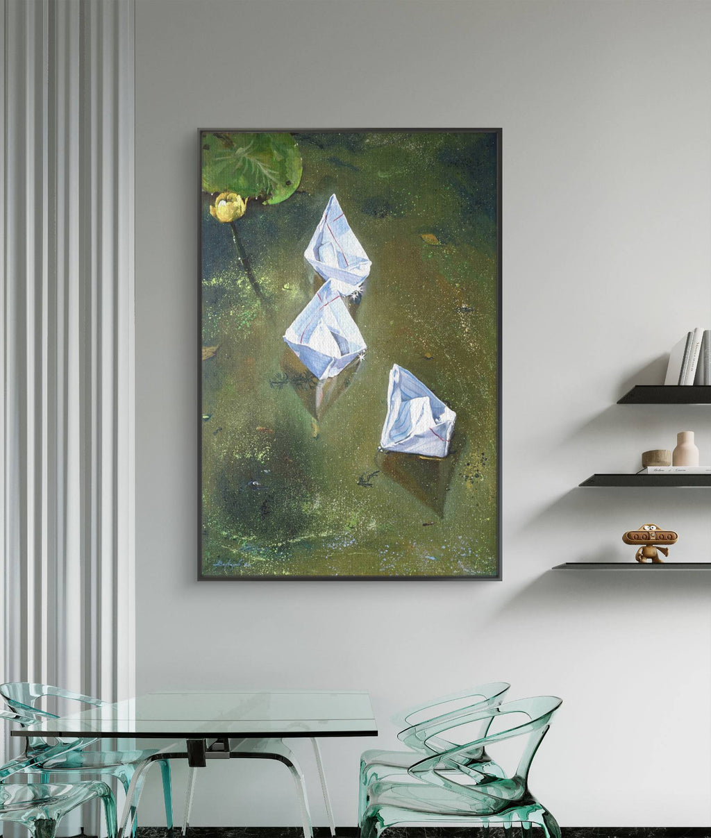 Landscape painting of geometric shapes on a wall above a glass table