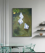 Landscape painting of geometric shapes on a wall above a glass table