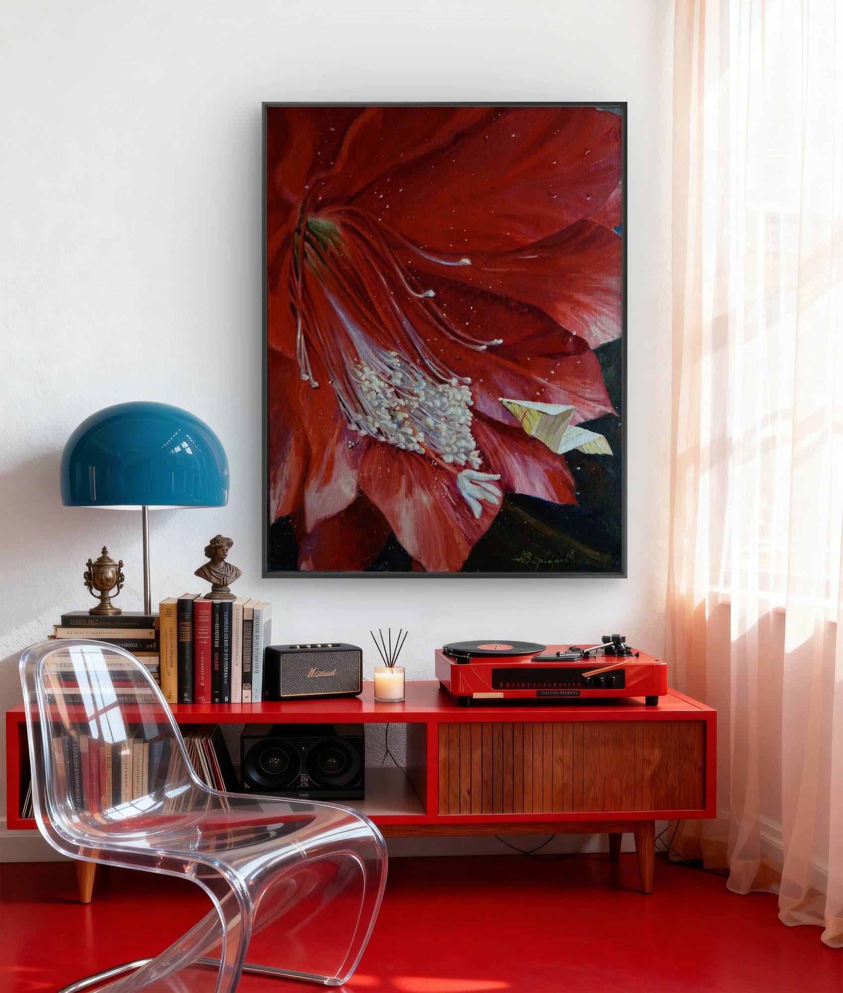 Living room with red cabinet, clear chair, blue lamp, and floral artwork.