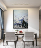 Dining room with a table and chairs, and a large painting of a boat on the wall.