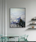 Framed artwork of a boat on water with ice in a modern interior setting.