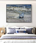 Framed artwork of a boat on water above a bed with matching bedding