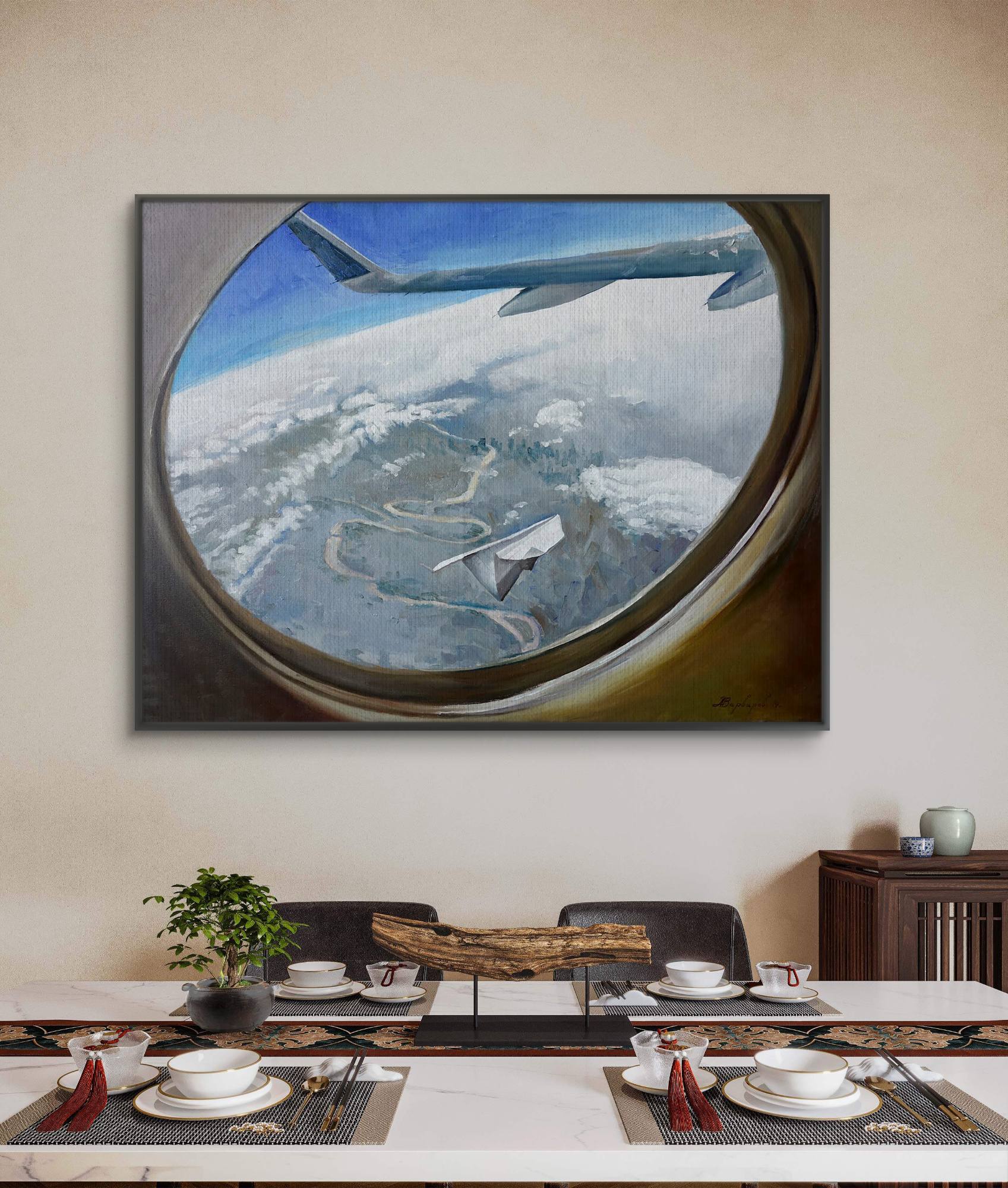 Airplane window painting near the table