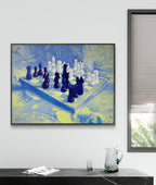 Framed abstract chess board painting on a wall with a window and table in the foreground.