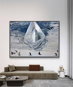 Framed artwork of penguins near a iceberg in a modern living room.