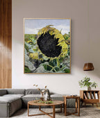 Framed artwork of a sunflower in a living room setting