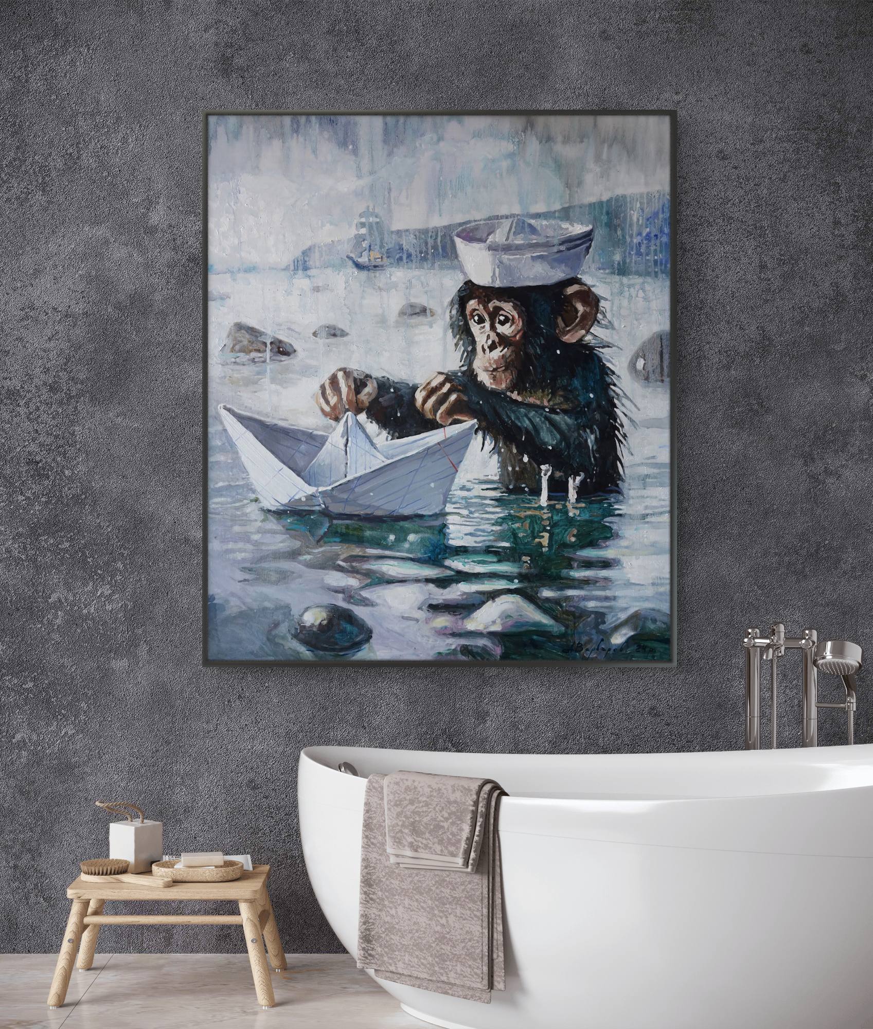 Framed artwork of a monkey with a sailor hat and paper boat on a gray wall above a bathtub.