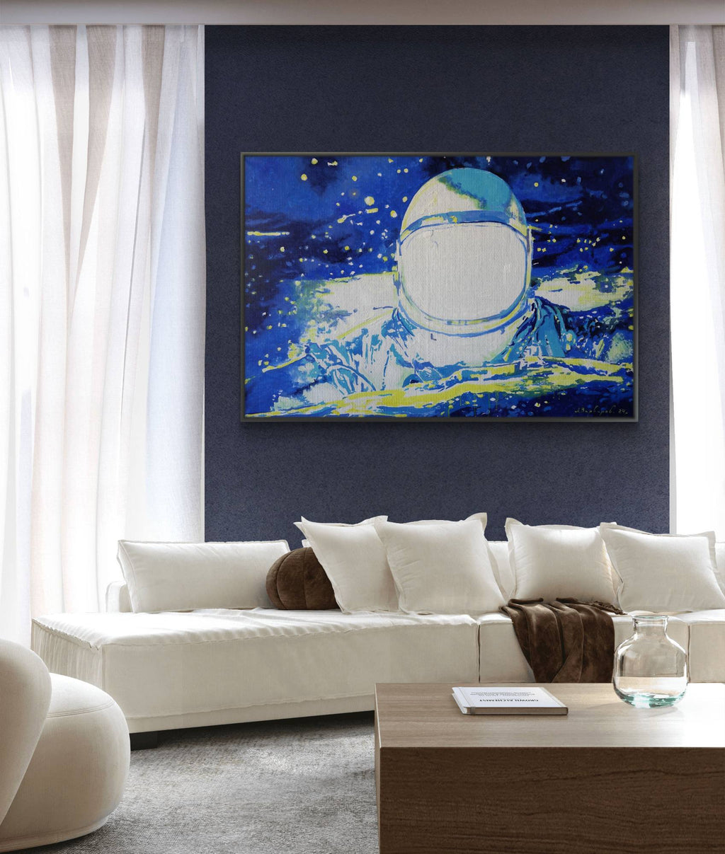 Modern living room with a large abstract painting of an astronaut on a dark blue background.