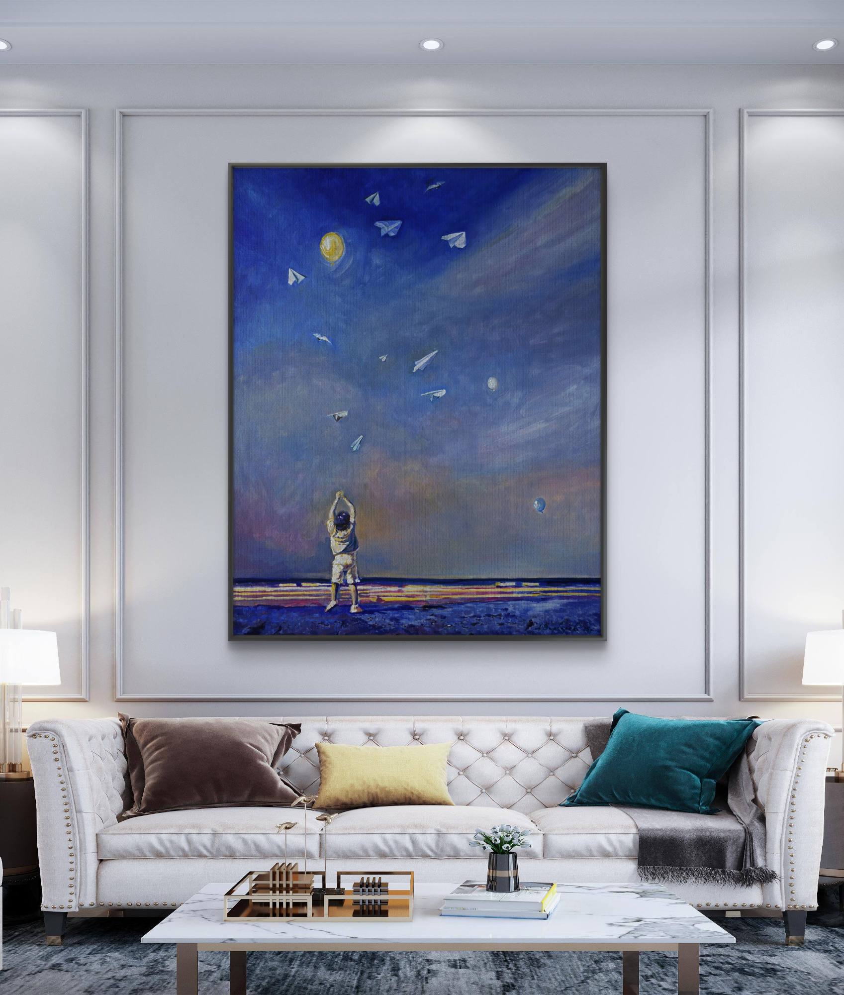 Framed artwork above a white sofa in a living room setting
